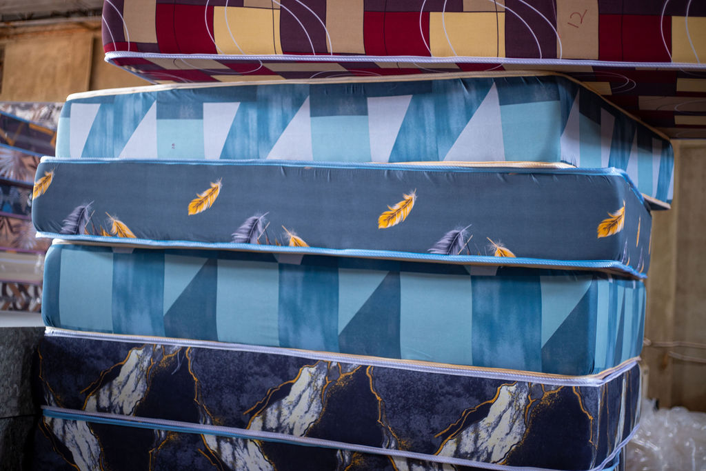 Durable institutional mattresses with geometric and marble finishes